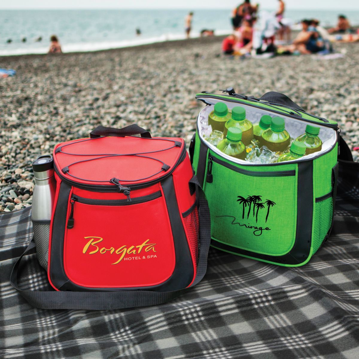 Image of branded cooler bags by the water